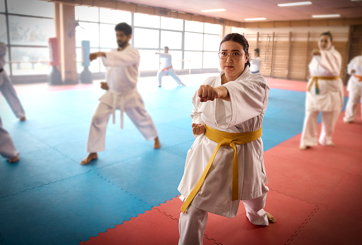 Woman taking a taekwondo class